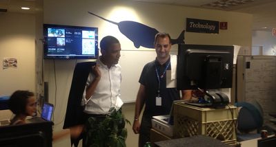 Jason Kunesh with President Barack Obama demonstrating Dashboard, the campaign's organizing tool.